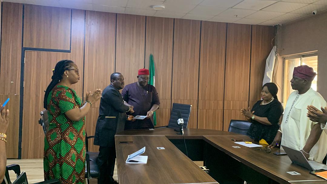 Handshake with Ministry Official